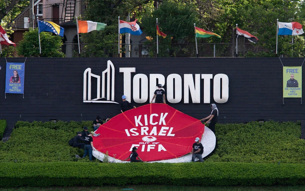 Activists rally to 'kick Israel out of FIFA' despite team's absence from World Cup