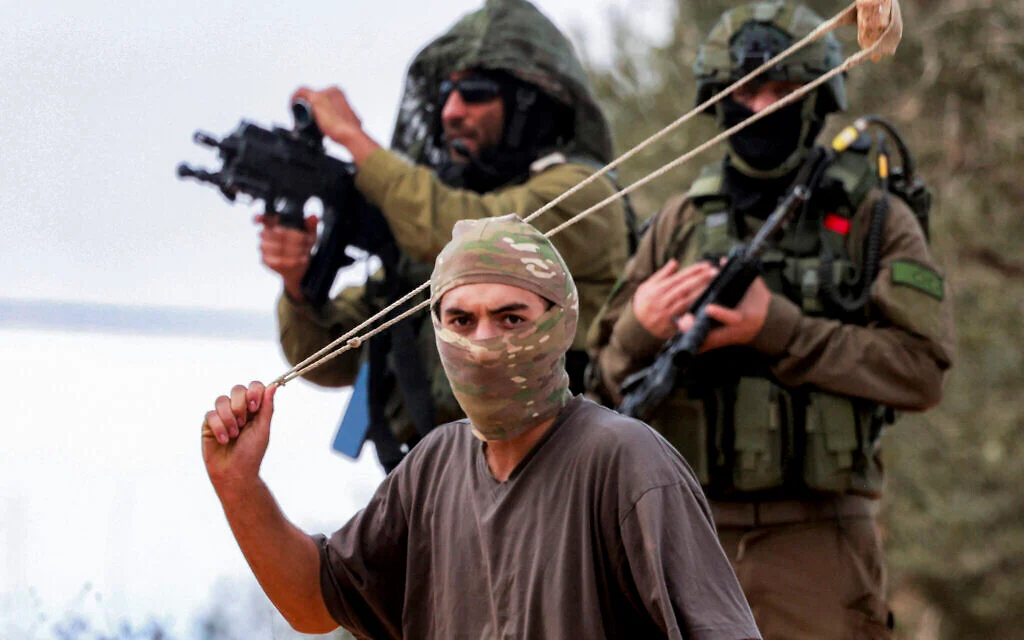 As settlers rampage, IDF soldiers accused of aiding violence, theft against Palestinians