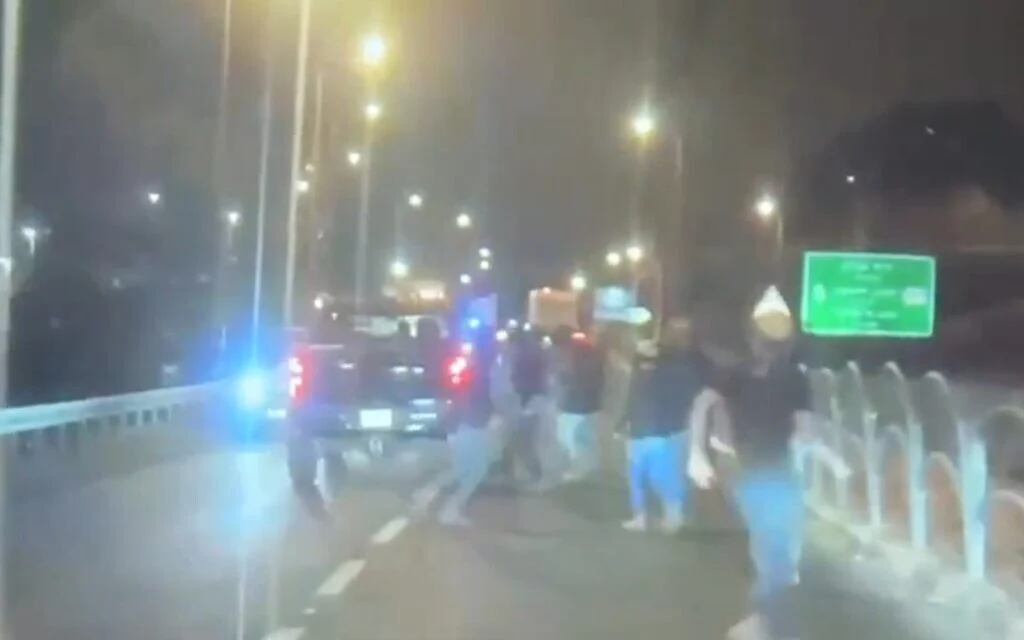 1 lightly hurt as Palestinian car hits settlers who blocked West Bank road and hurled stones