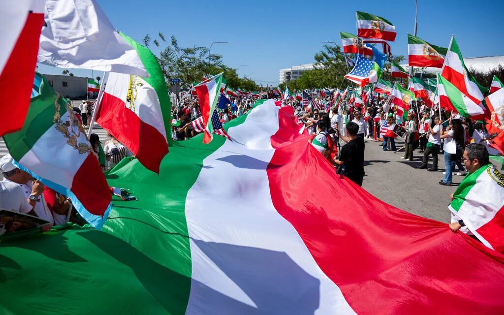 Torn Iranian Americans plan protests, watch parties for team's World Cup opener
