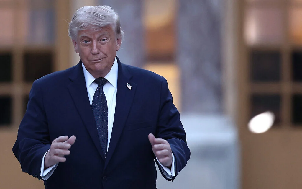 Trump signs deal with Iran, which says 'now it's time to test the implementation'