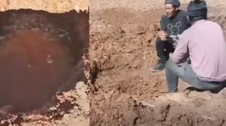 La falta de agua obliga a transportistas varados por bloqueos a cavar un pozo en la ruta La Paz
