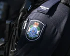 Queensland police shoot pet dog after running it over as distressed residents watch on