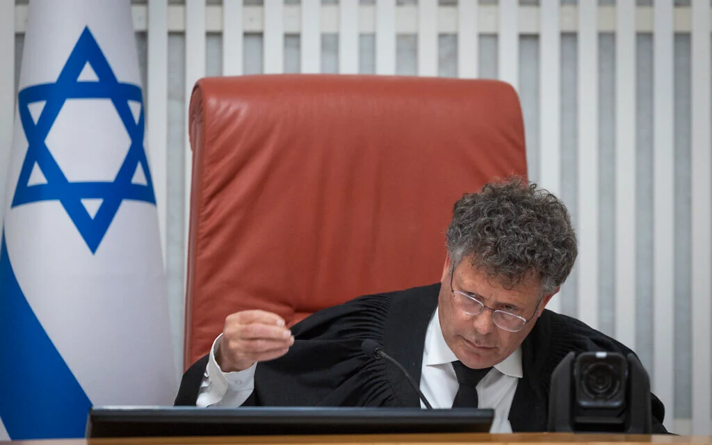 Haredi protesters rally outside chief justice's home to oppose draft dodger's arrest