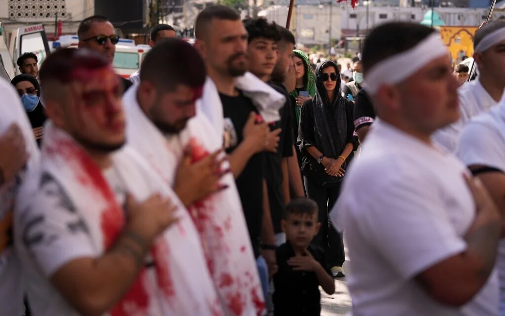 Massive Shiite crowds gather across region to mark Ashura in shadow of war