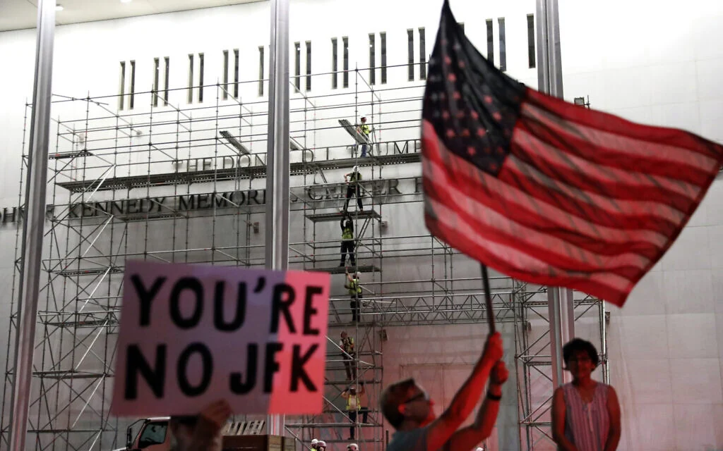 Workers begin removing Trump's name from Kennedy Center, hours after court deadline