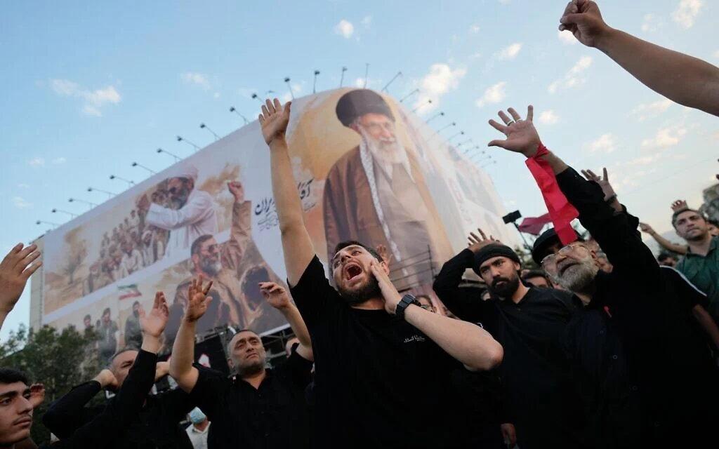 Funeral procession for slain Iranian leader Khamenei sets off in central Tehran