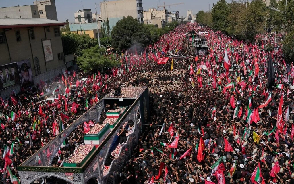 Masses accompany Khamenei funeral procession through Tehran as throngs chant for revenge