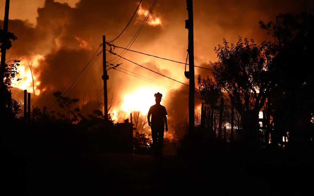 Massive wildfires tear through southern Europe forcing thousands to flee